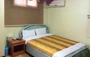 Kamar Tidur 6 Busan Jang Motel