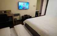 Kamar Tidur 6 Audi Garden Business Hotel