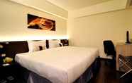 Kamar Tidur 5 Audi Garden Business Hotel