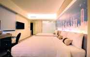 Kamar Tidur 2 Audi Garden Business Hotel