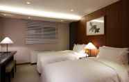 Bedroom 4 Oriens Hotel & Residences