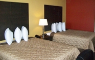 Bedroom 4 Americas Best Value Inn Tupelo