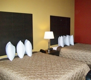 Bedroom 4 Americas Best Value Inn Tupelo