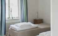 Bedroom 7 Stora Torget - Visby Lägenhetshotell