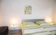 Bedroom 6 Appartementanlage-Ferienwohnungen Weiße Möwe