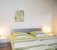 Bedroom 6 Appartementanlage-Ferienwohnungen Weiße Möwe