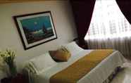 Bedroom 6 Hotel Bolivar Plaza Manizales