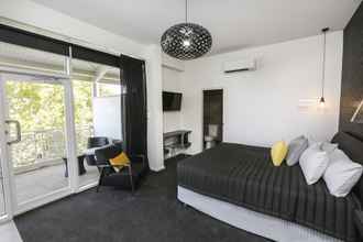 Bedroom 4 Indulge Apartments CBD