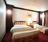 Kamar Tidur 4 Onyang Grand Hotel