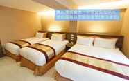 Kamar Tidur 2 Wecan Hotel