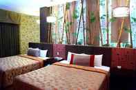 Kamar Tidur Sun Garden Motel Ming Cheng