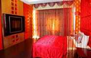 Kamar Tidur 7 Sun Garden Motel Ming Cheng