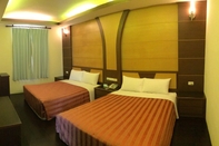 ห้องนอน Shang Yong Vacation Inn