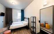 Bedroom 2 a&o Stuttgart City - Hostel