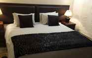 Kamar Tidur 6 Magaliqua Guest House