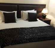 Kamar Tidur 6 Magaliqua Guest House