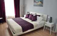 Kamar Tidur 5 At Home Bed and Breakfast