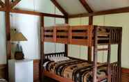 Bedroom 3 Indian Flat RV Park - Tent Cabins & Cottages