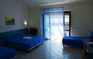 Phòng ngủ 3 Villaggio Club Baia di Dino