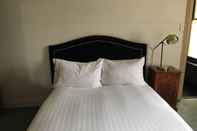 Kamar Tidur The Macquarie Hotel