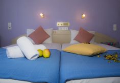 卧室 4 Nikos Hotel