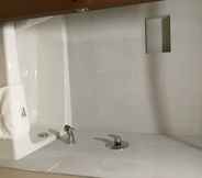 In-room Bathroom 3 Super 8 by Wyndham National City Chula Vista