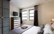 Kamar Tidur 5 Reubens Court and City Apartments