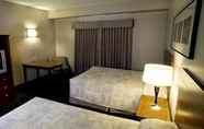 Kamar Tidur 6 Heritage Inn & Suites