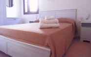 Kamar Tidur 3 Appartamenti Castelsardo E Lu Bagnu