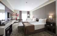 Bedroom 6 Ramada Hotel & Suites by Wyndham Istanbul Merter