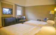 Kamar Tidur 6 Dayhello International Hotel