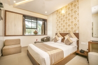 Phòng ngủ Aishwarya Suites