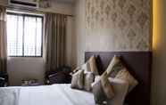 Bedroom 5 Aishwarya Suites