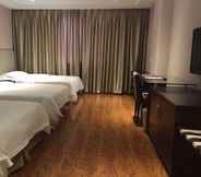 ห้องนอน 7 GreenTree Alliance YanTai YingChun Street Green Homeland Hotel