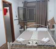 Kamar Tidur 7 Tamer guest house