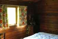 Kamar Tidur Riverside Adventures Vacation Rentals