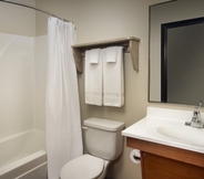 In-room Bathroom 4 WoodSpring Suites Louisville Jeffersontown