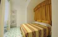 Bedroom 5 Surriento Suites