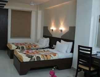 Kamar Tidur 2 Orchid Business Luxury Hotel