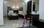 Kamar Tidur 6 Orchid Business Luxury Hotel