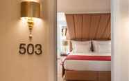 Kamar Tidur 3 The 7 Hotel