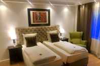 Kamar Tidur Hotel Ramor