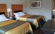 Kamar Tidur 4 Great Western Inn Suites