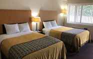 Kamar Tidur 5 Great Western Inn Suites