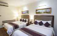 Bedroom 2 Royal Park Residence Hotel