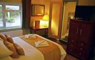 Kamar Tidur 6 The Stones Hotel