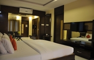 Phòng ngủ 2 Hotel Harsha Residency