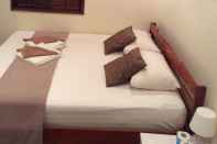 Kamar Tidur Shine Talay Guesthouse