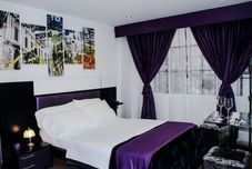 卧室 Hotel Olimpo Resort