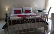 Kamar Tidur 4 HILLS FARM STAYS